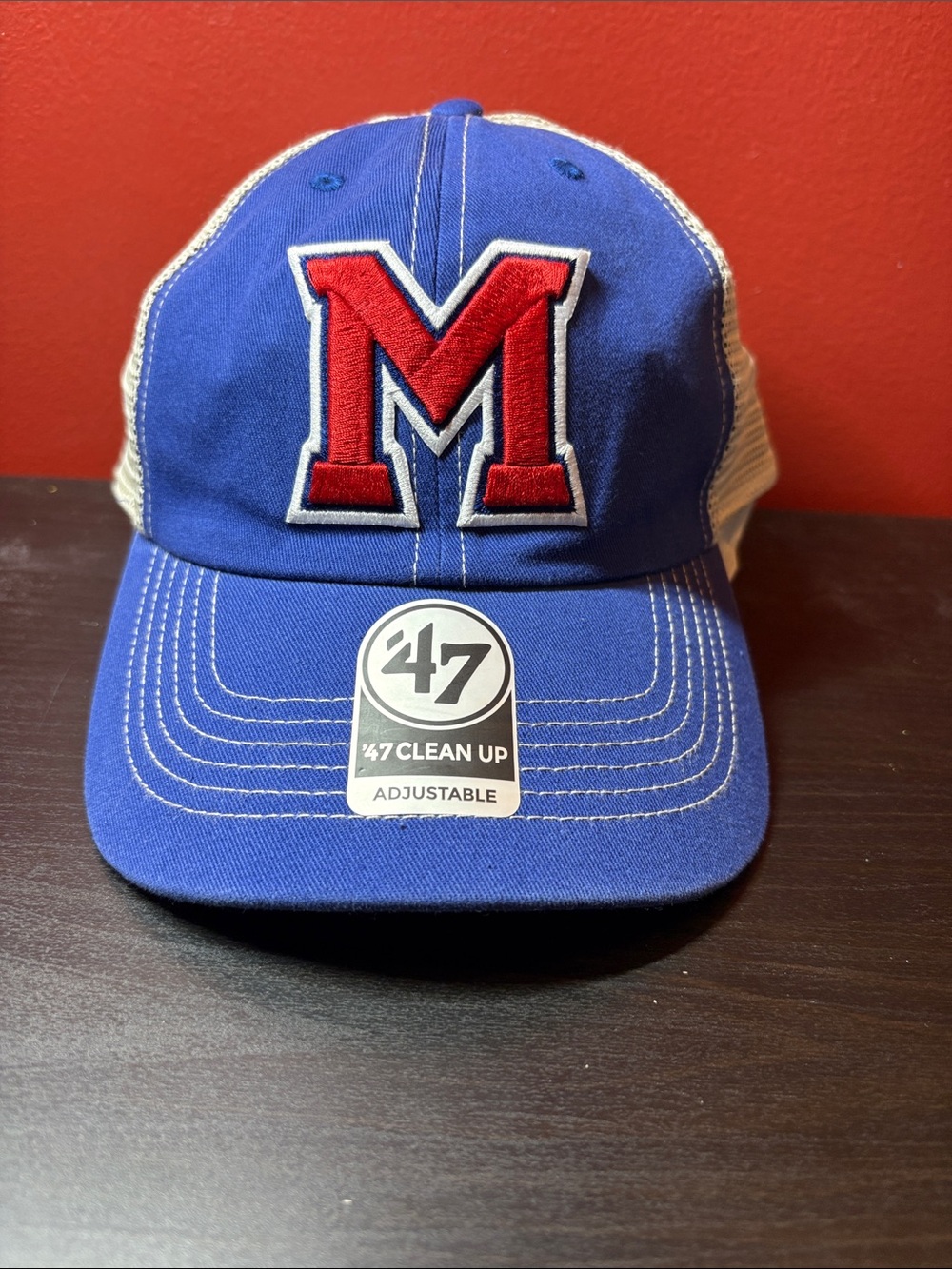 47 Blue Trucker Hat with Red M Patch from ncaa